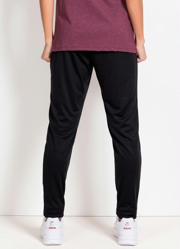 Moda Pop - Calça Preta com Recortes Laterais Estampados 2